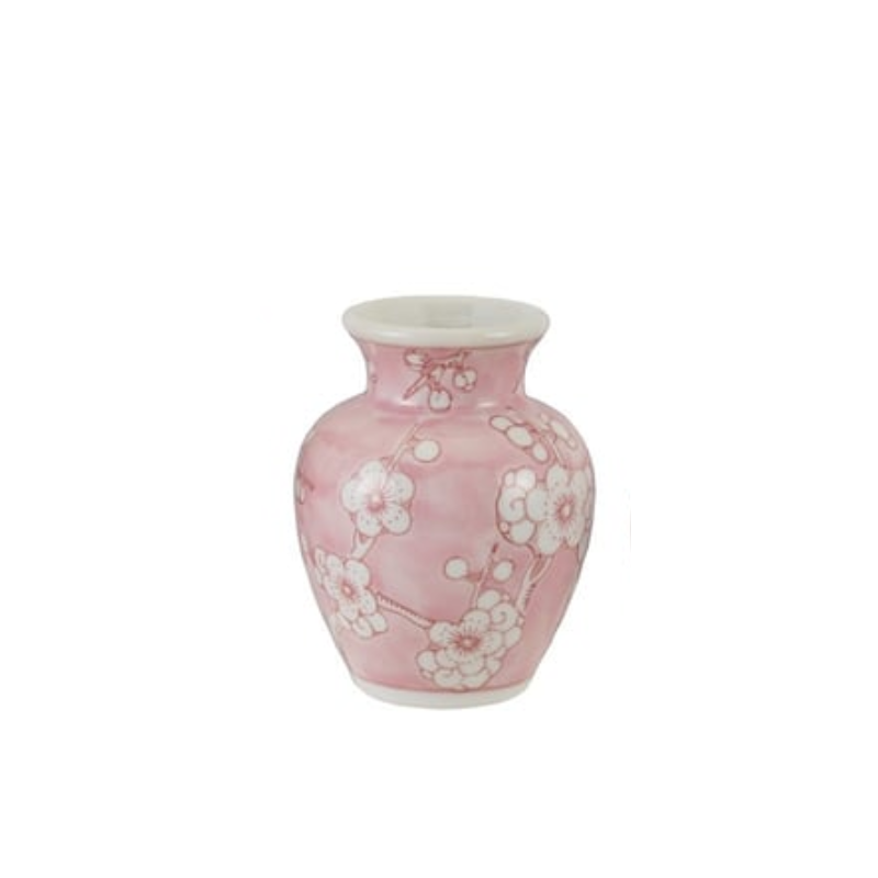 Small hand-painted pink stoneware vase with white cherry blossom branch patterns.