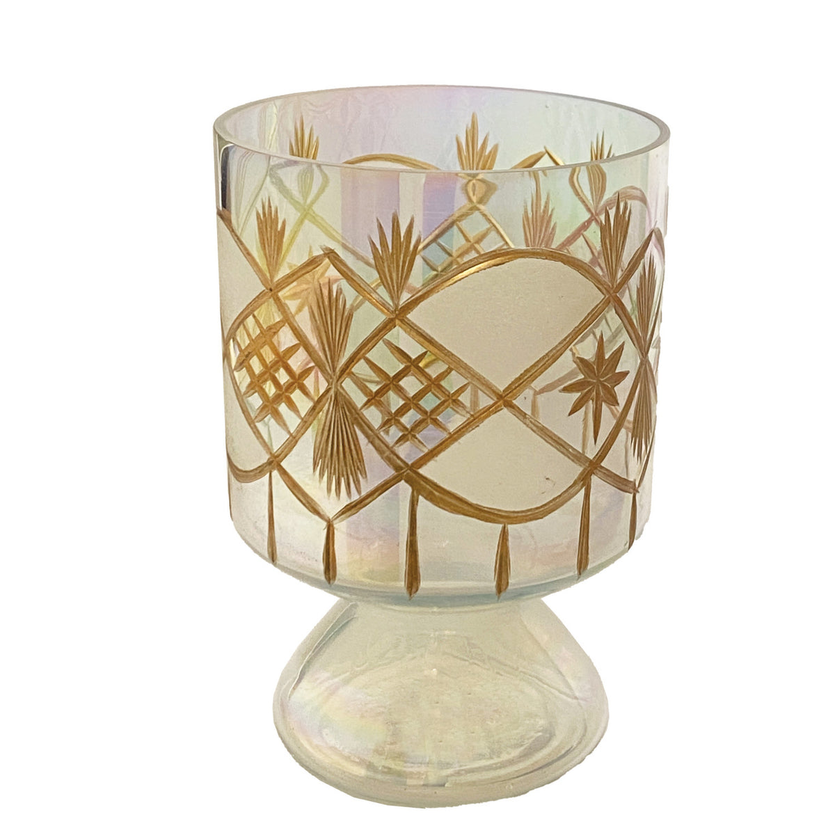 Hand-blown iridescent glass footed votive holder with etched gold geometric and star patterns.