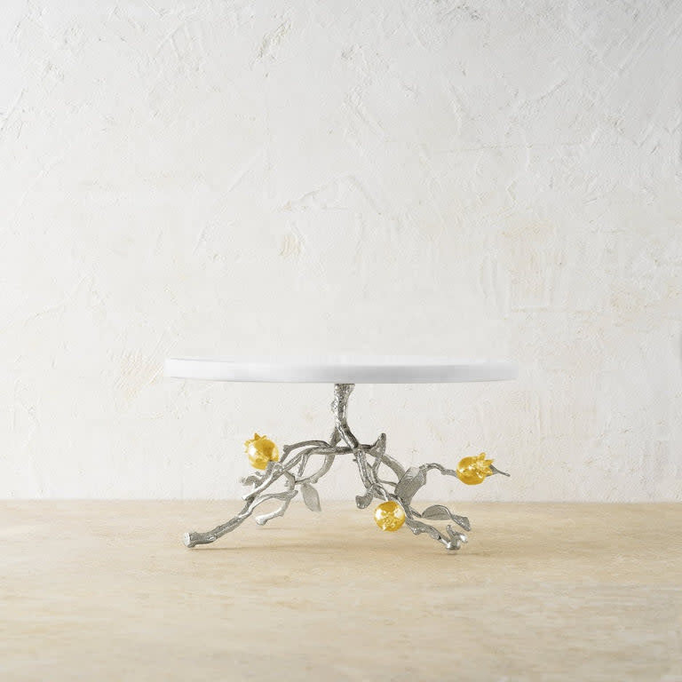 Nickelplate marble cake stand with gold accents shaped like a pomegranate
