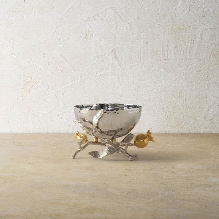 Silver nut bowl with gold pomegranate motif on stainless steel