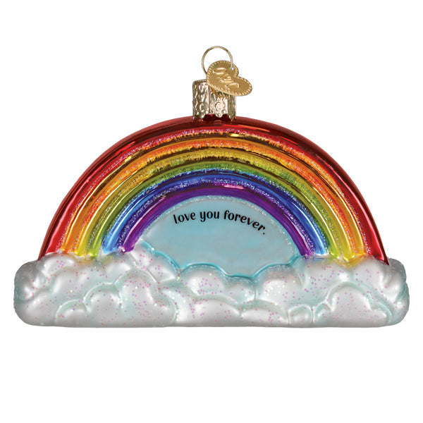 Wooden pawprint ornament with heart-shaped cutout featuring engraved text.