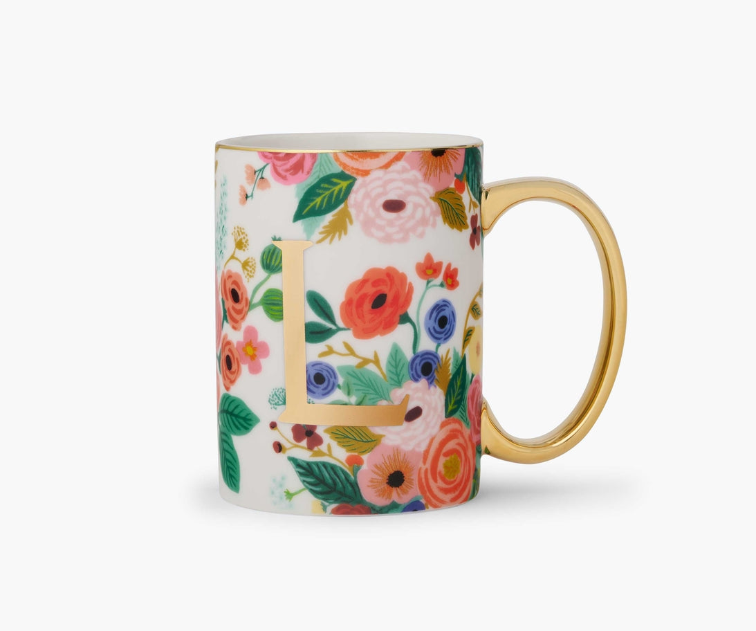 Garden Party porcelain mug with a floral pattern, gold handle, and gold foil monogram letter L.