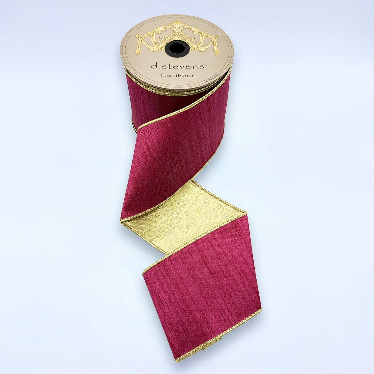 4 inch wide wine-colored slub dupion ribbon with a metallic gold back on a d.stevens spool.