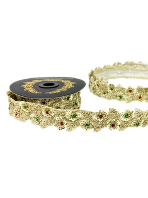 Metallic gold dupion ribbon with embroidered flowers, leaves, and red and green jewels.