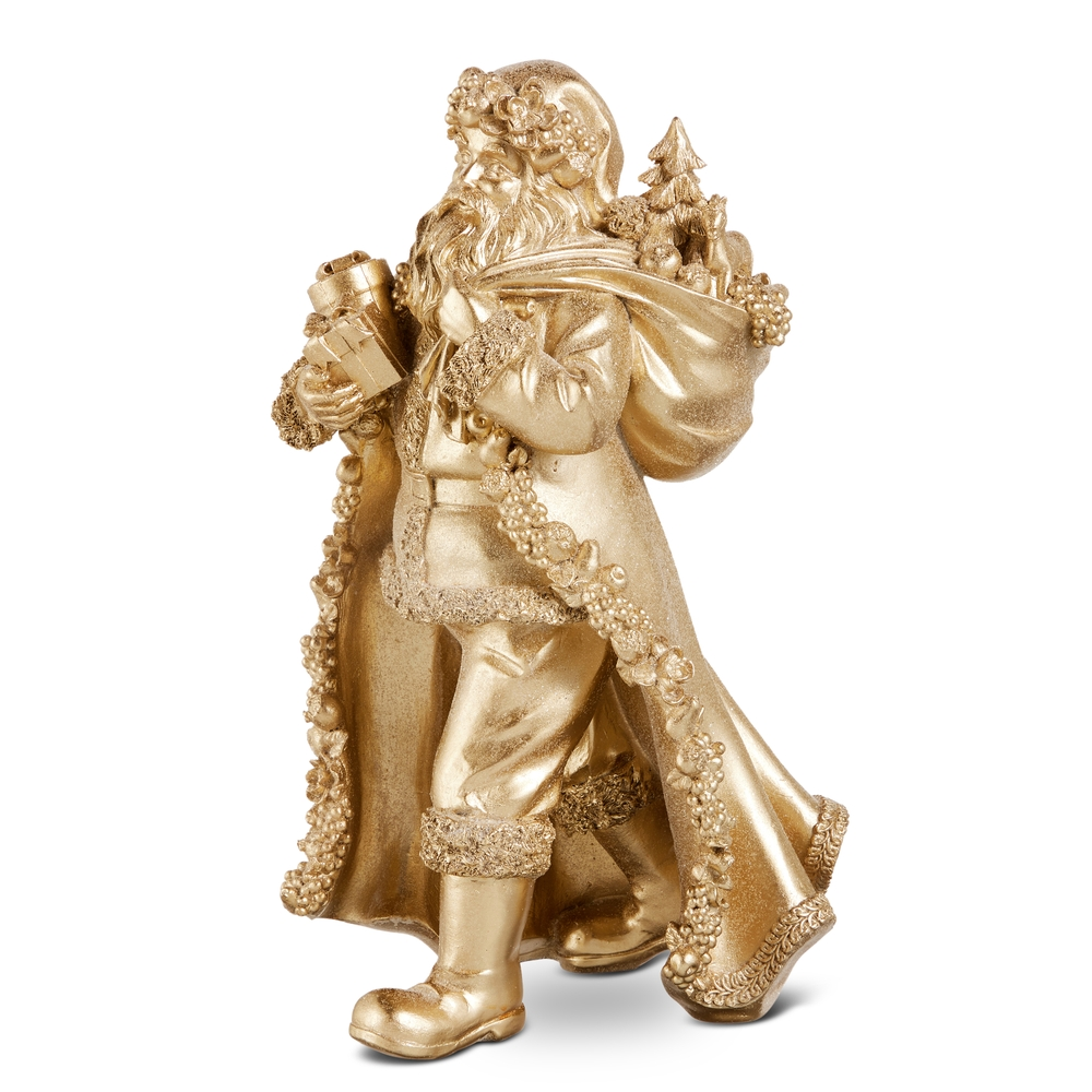 14-inch gold Santa figurine carrying a gift and a sack of toys with fruit-trimmed robe details.