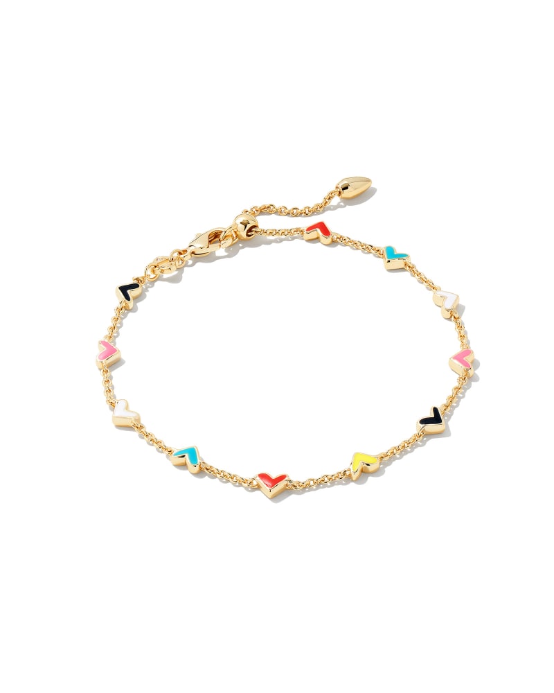 Gold chain bracelet with small colorful enamel heart charms in red, blue, yellow, pink, and black.
