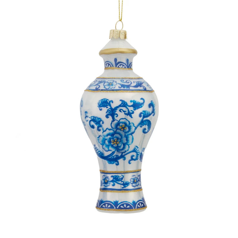 Blue and white glass vase ornament with floral patterns and gold glitter accents.