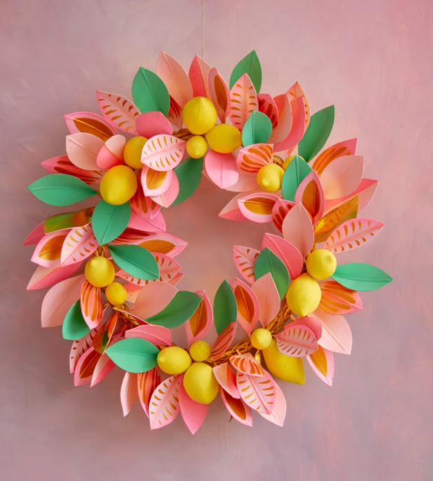 Paper mache citrus lemon wreath with green foliage accents