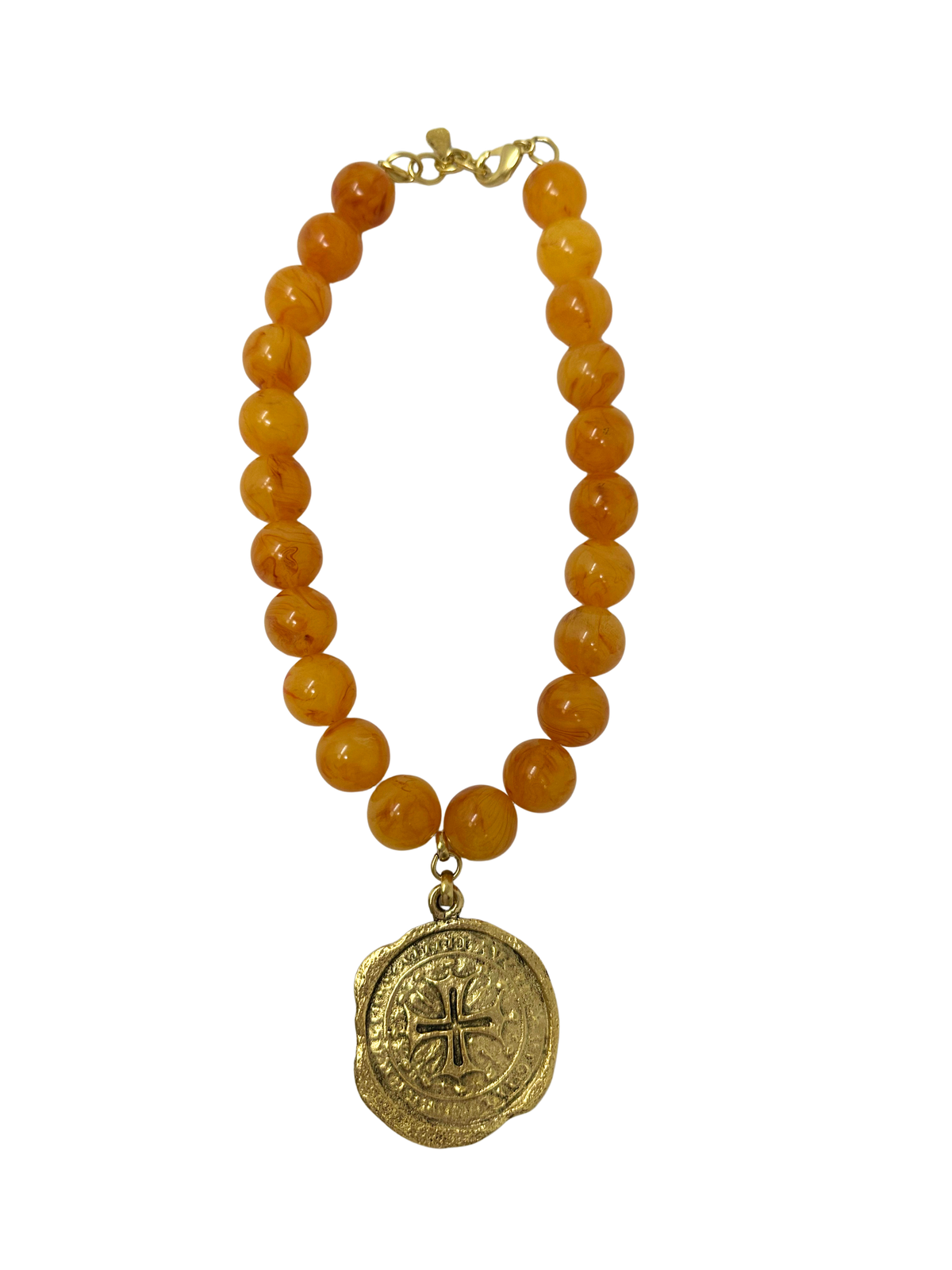 Vintage 18-inch necklace featuring amber-colored beads and a gold-tone coin medallion pendant.