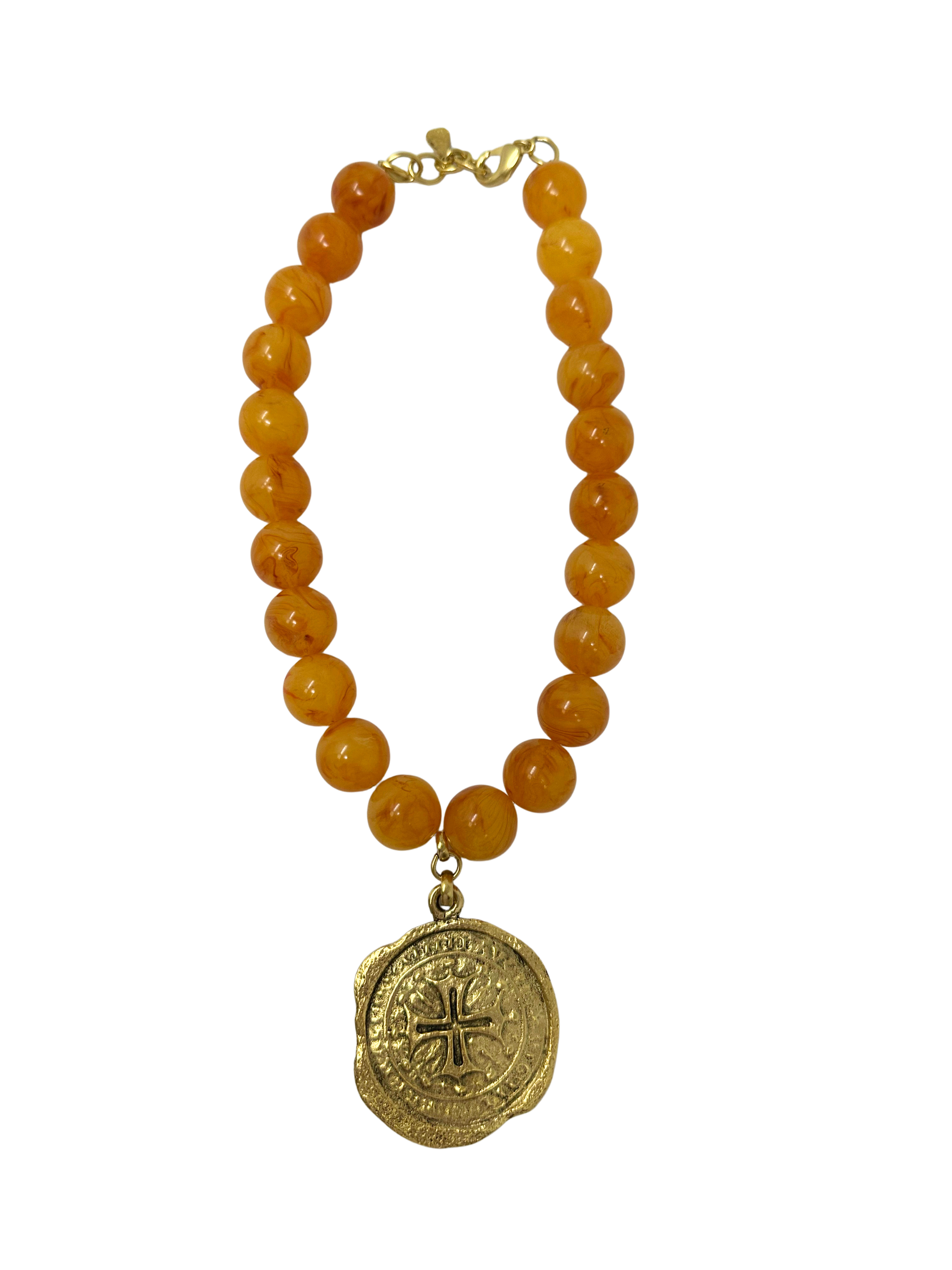 Vintage 18-inch necklace featuring amber-colored beads and a gold-tone coin medallion pendant.