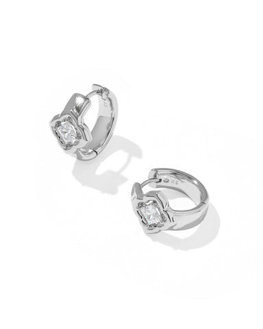 Silver Mallory Crystal Huggie Earrings with signature medallion logo and white cubic zirconia.