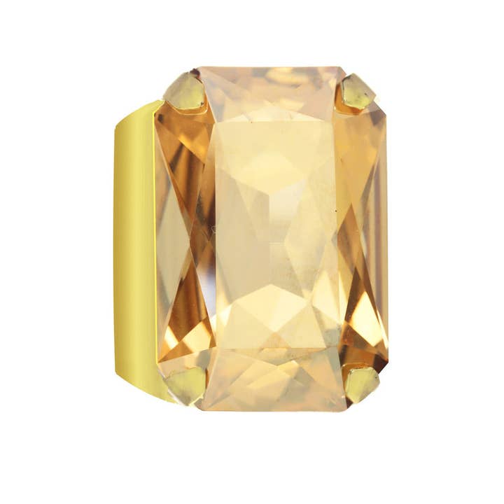 Gold Mini Soleil ring with a sun-shaped halo setting on a thin band.