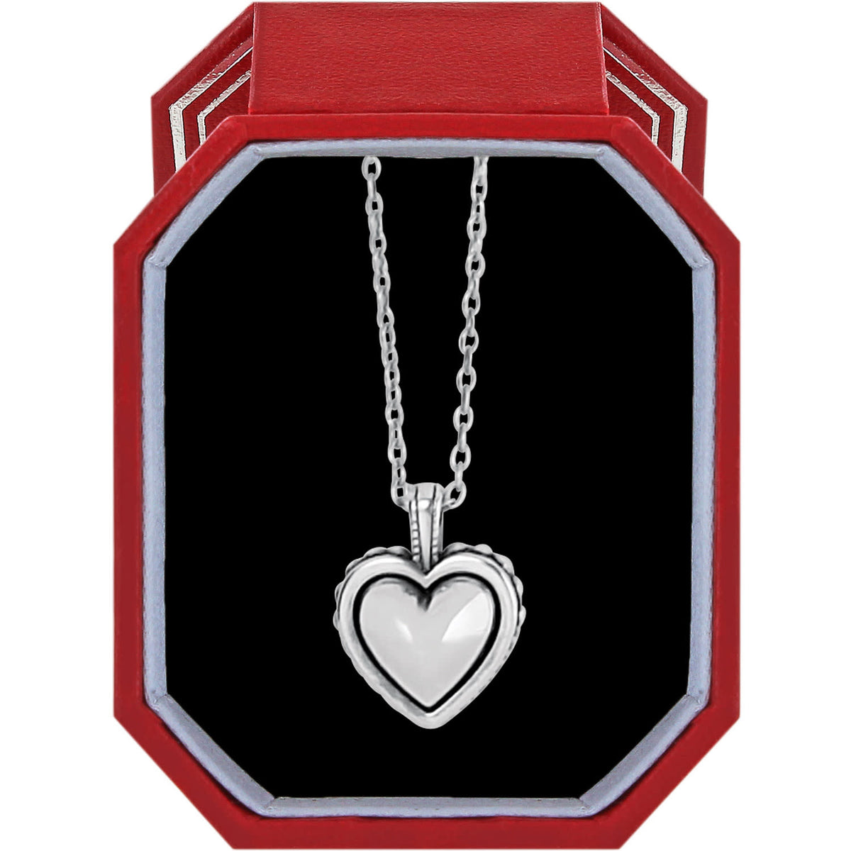 Silver plated petite necklace with a bulbous heart pendant surrounded by sculpted studs on an adjustable chain.