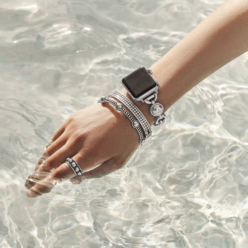 Silver plated fold-over clasp watch band with large polished bold studs