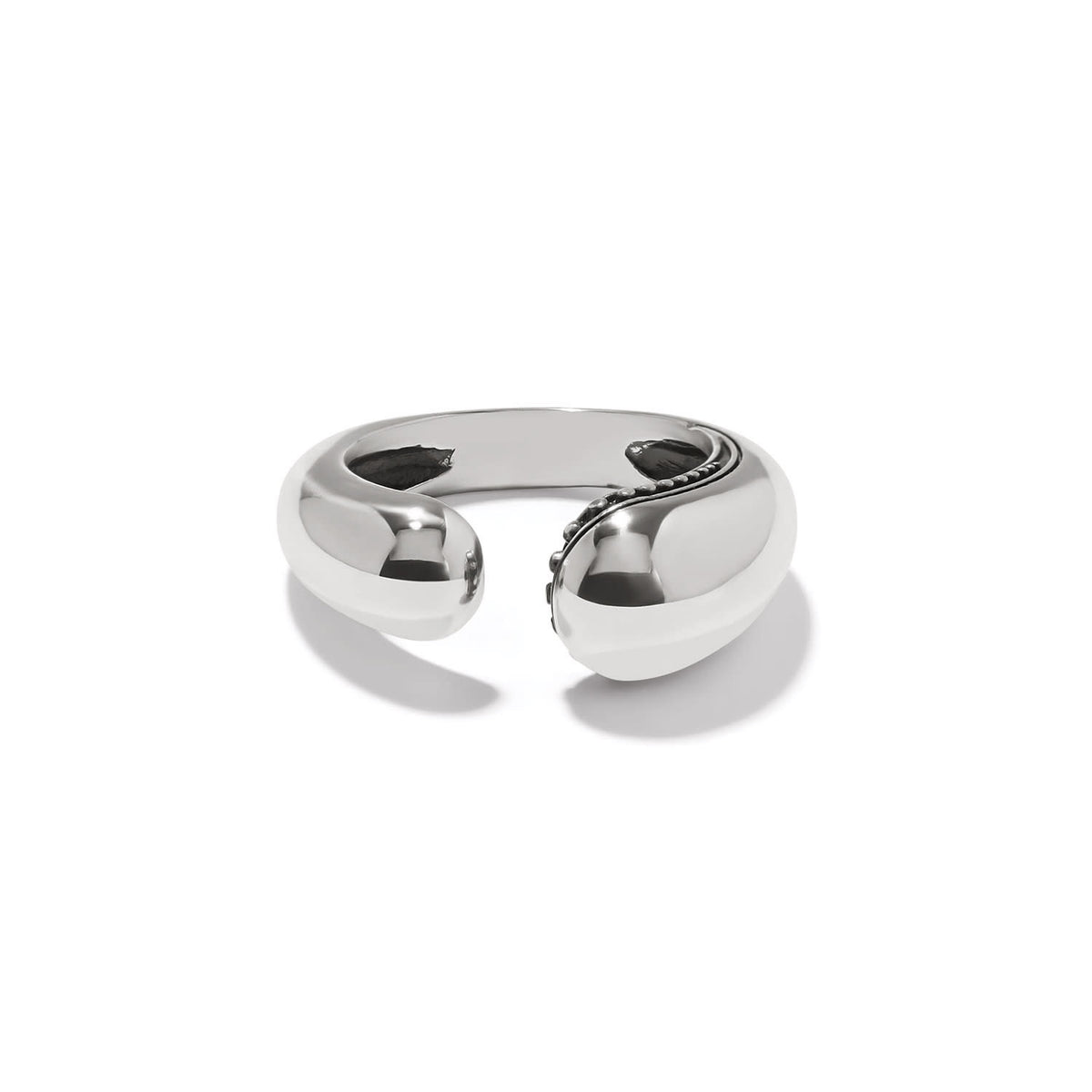 Silver plated droplet ring with a curvaceous organic silhouette featuring tiny beading on one side and smooth finish.