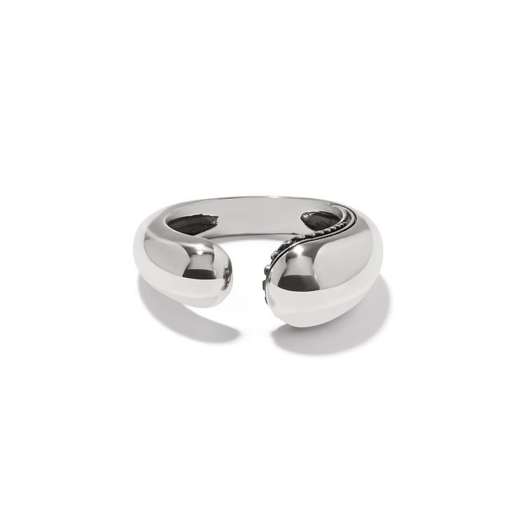 Silver plated droplet ring with a curvaceous organic silhouette featuring tiny beading on one side and smooth finish.