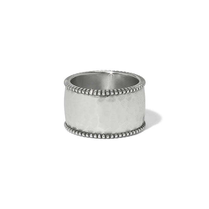 Wide silver-plated ring with hammered band, studded edges, and rectangular black crystal gemstone.
