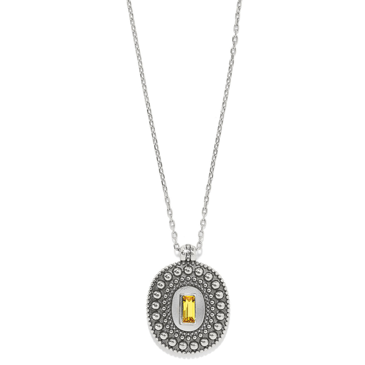 Silver plated necklace with a hand-set light topaz rectangular stone featuring granulation detailing.