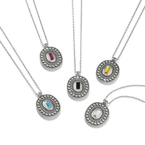 Silver plated necklace with a hand-set rectangular crystal pendant featuring granulation detailing