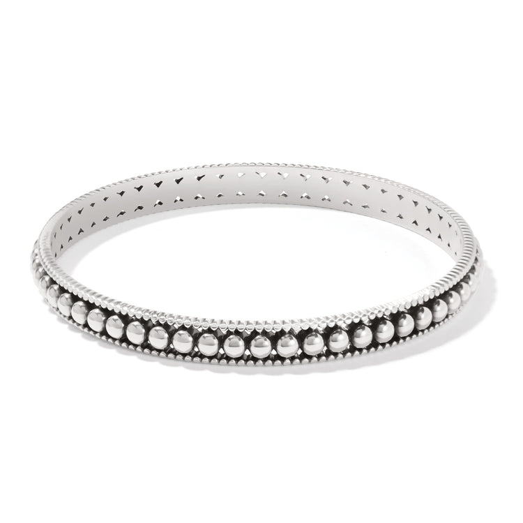 Silver plated slim bangle with symmetrical pierced channel beads and linear textured sides.