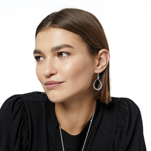 Silver plated teardrop French wire earrings with a 7/8-inch width and 1 3/8-inch drop.