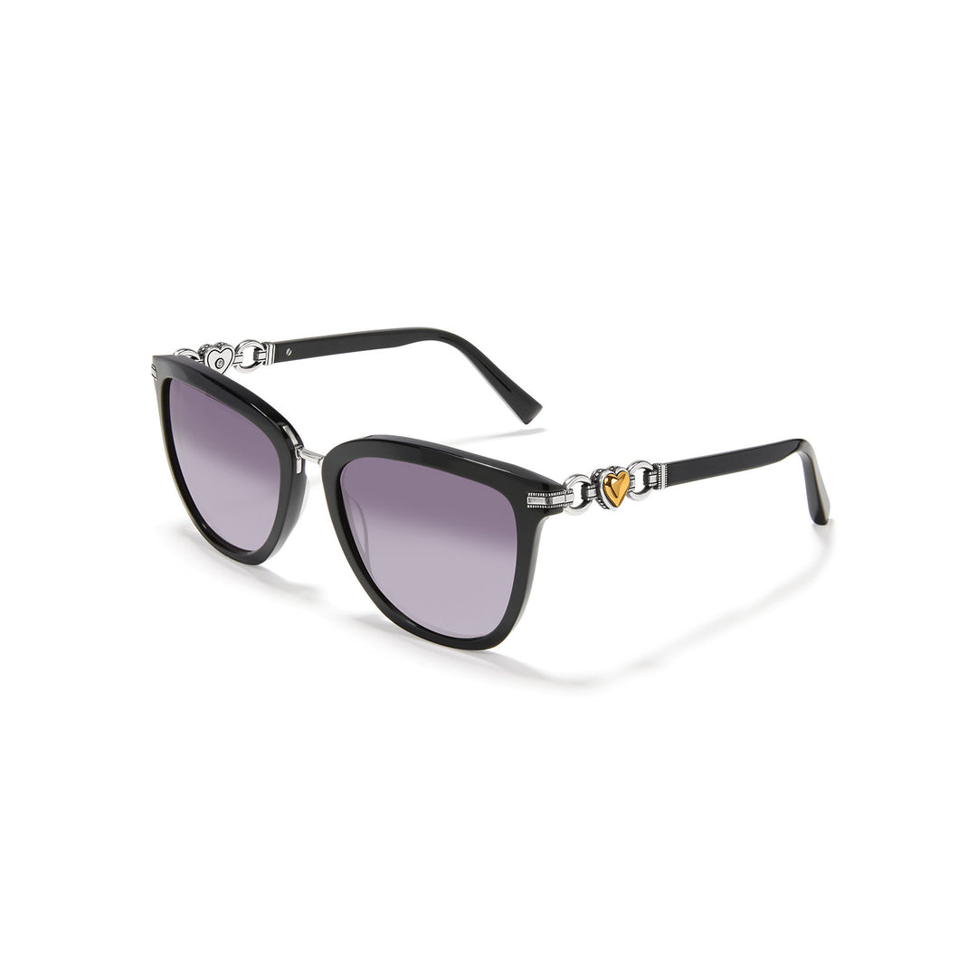 Cat eye sunglasses with black frames, silver plated accents, and a two-tone heart-shaped lens design.