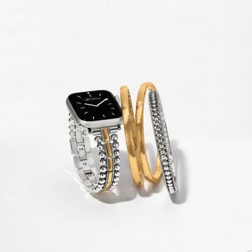 Side view of a silver and gold two-tone watch band with removable links and fold-over clasp.