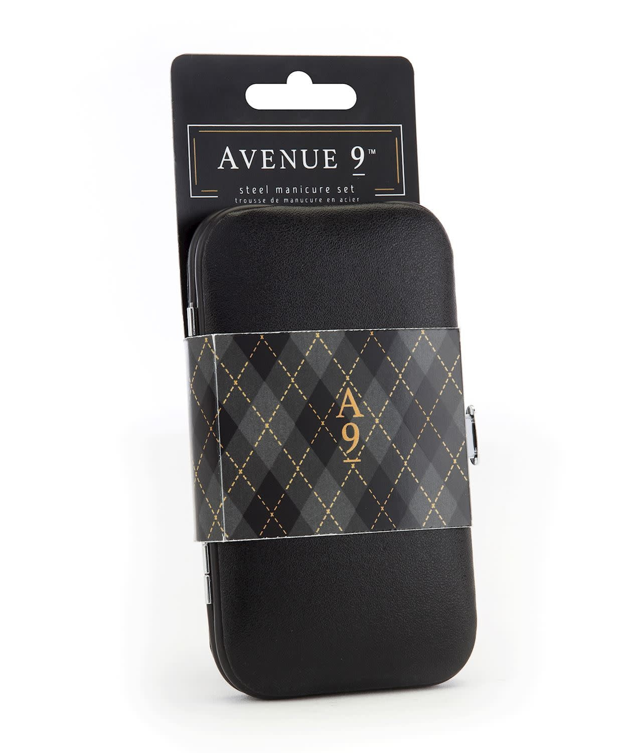 Compact travel case containing carbon steel manicure tools including cuticle pusher, nail clippers, scissors, file, and tweezers.