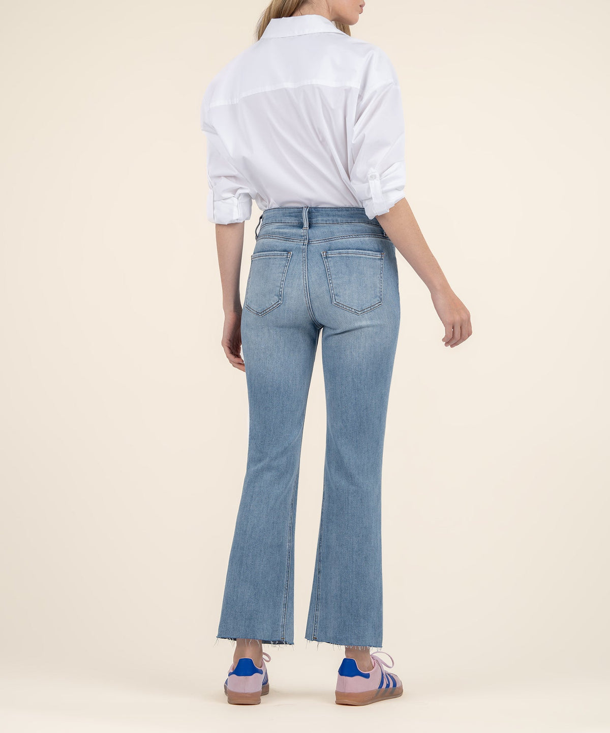 Kelsey high-rise flare jeans in dark wash denim with a wide ankle opening.