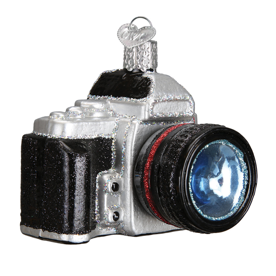 Silver and black glittery glass camera Christmas ornament with a blue lens and red ring detail.