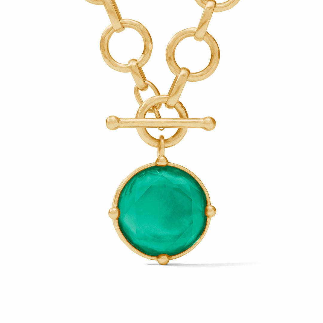 Honeybee Statement Necklace in 24K gold plate with an iridescent emerald green glass pendant.