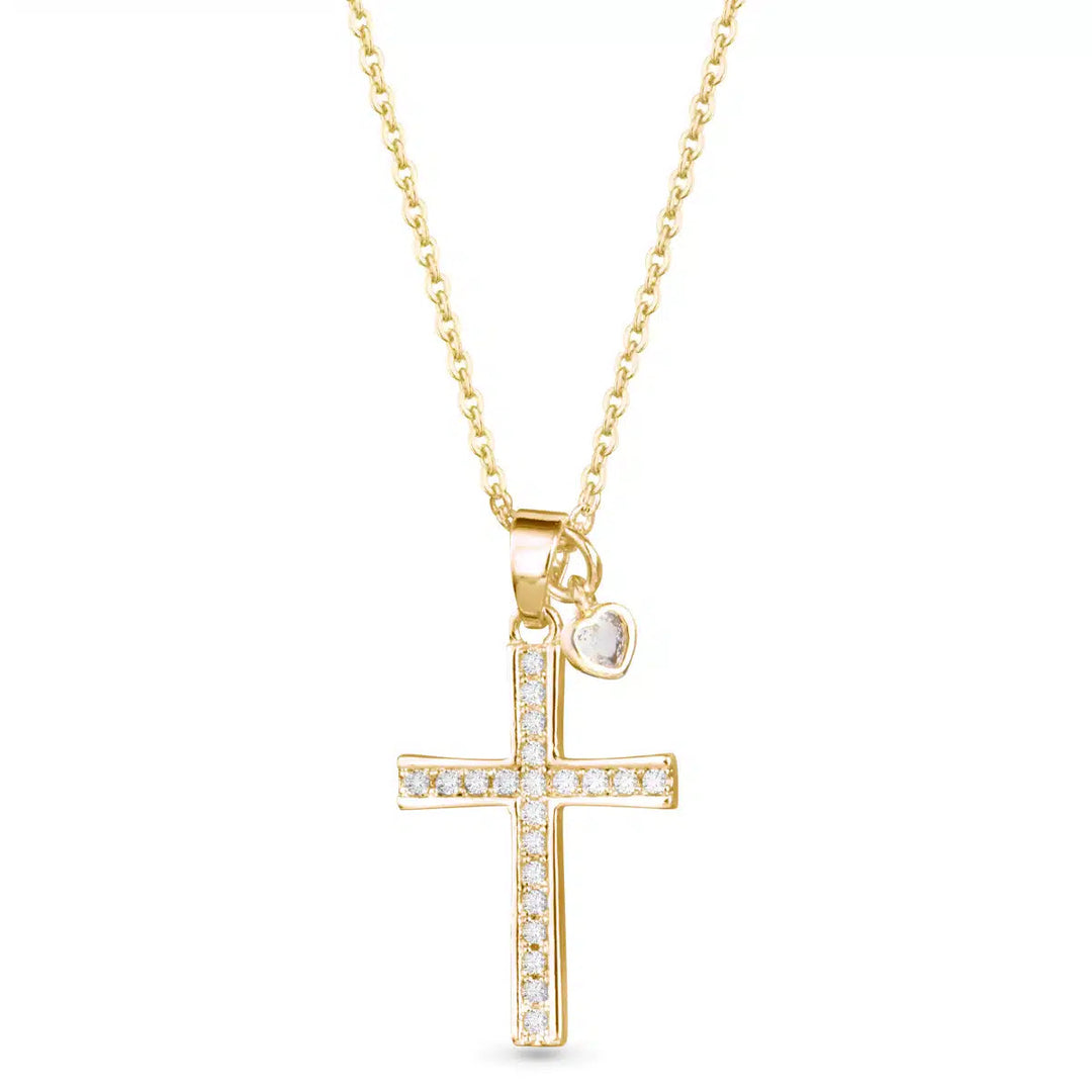 Gold pave cross necklace with a small dangling heart droplet charm on a delicate chain.