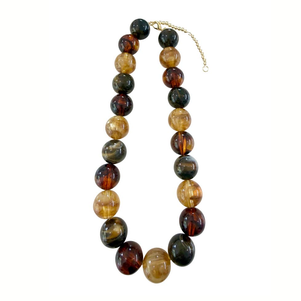 Ava Chunky Beaded Necklace with large, marbled resin beads in earth tones and gold-plated hardware.