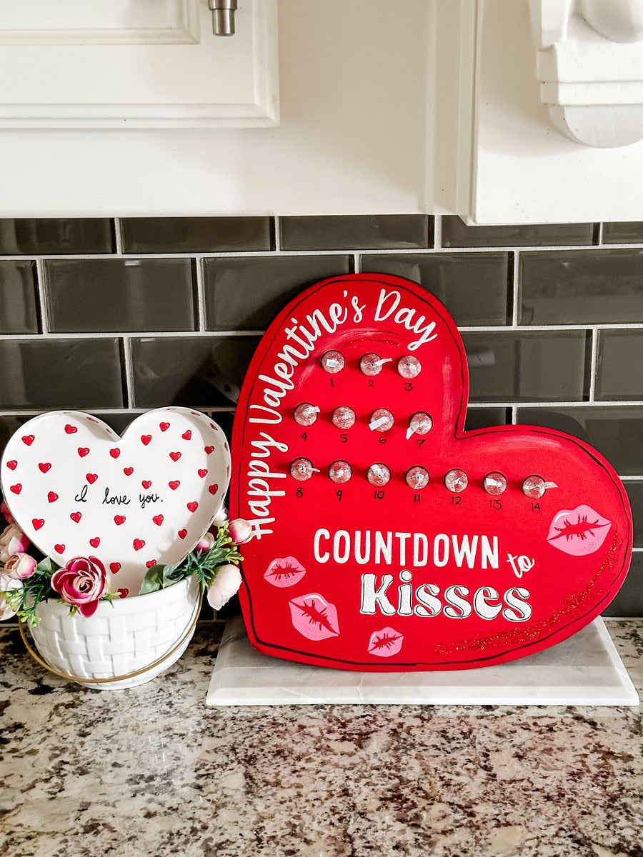 Ceramic heart-shaped serving tray with a glossy finish.