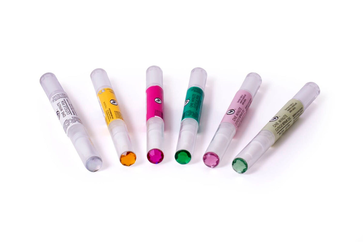 Six colorful Cuticle Repair Pens with jewel-topped caps arranged in a fan shape on a white surface.