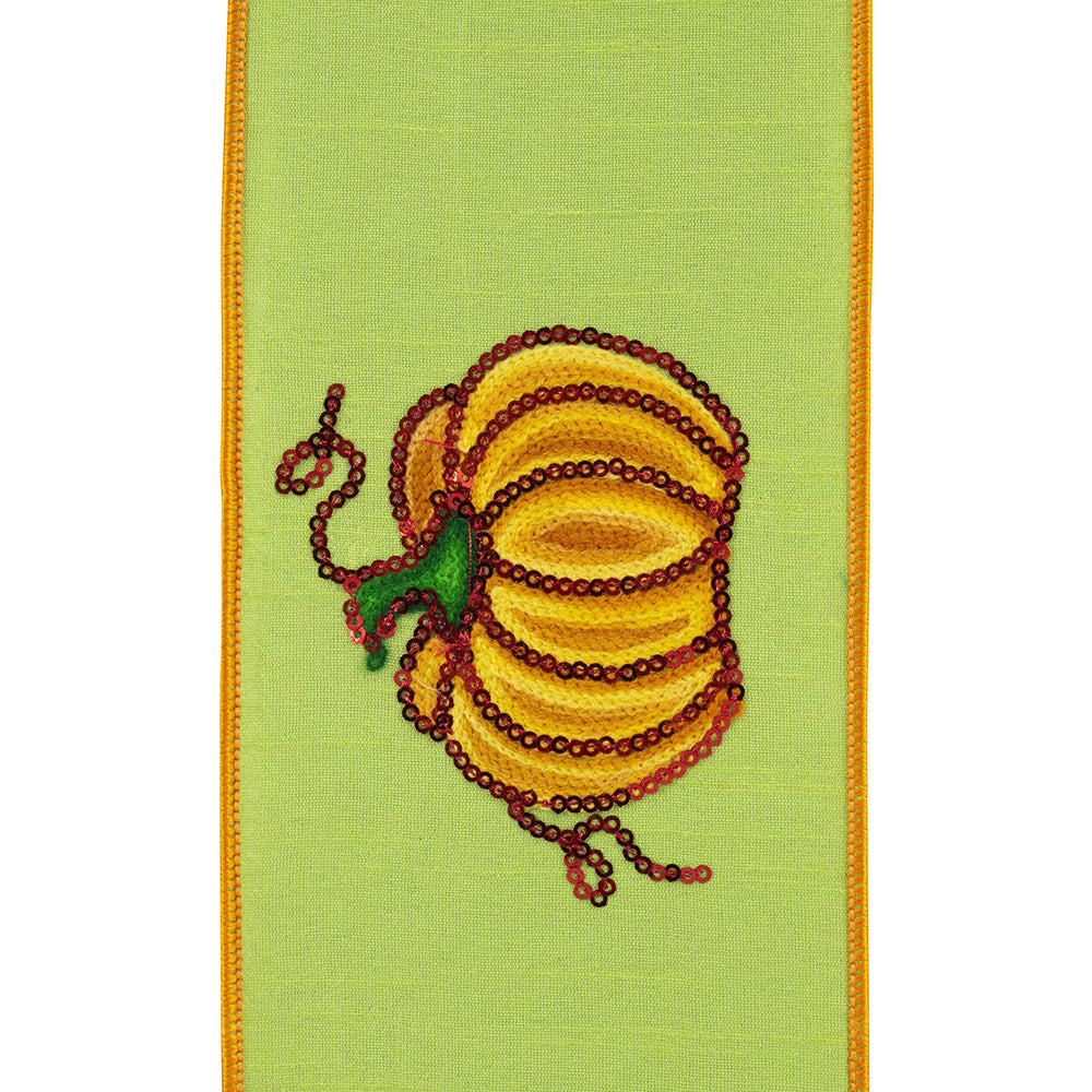Citrus green ribbon with sequined pumpkin pattern and orange wired edges.
