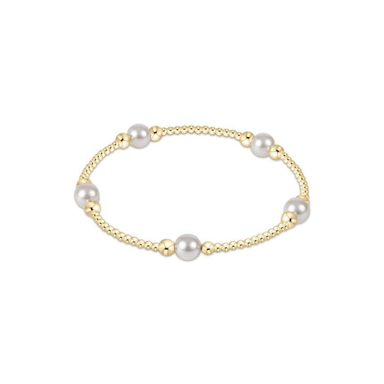Gold Purpose Pearl bracelet featuring luminous pearls with a gold accent bead.