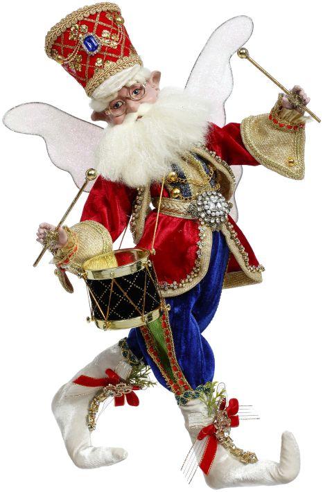 Medium nutcracker fairy in red and blue with white shoes holding drumsticks.