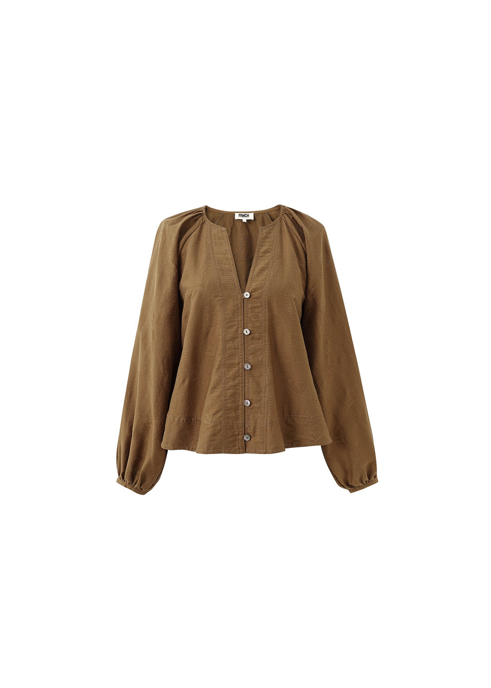 Pensee blouse in textured fabric with long puff sleeves, V-neckline, and loose flowing fit.