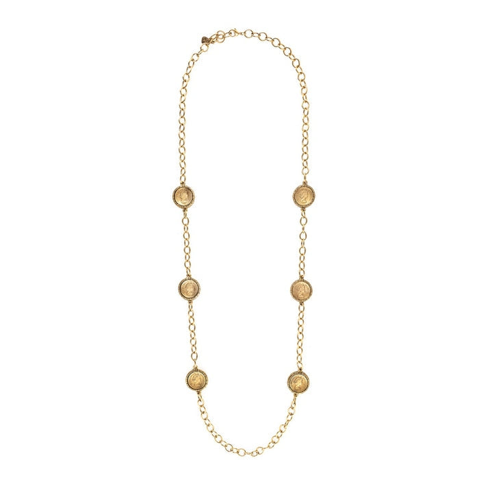 Travis gold-tone chain necklace featuring six vintage-inspired coin charms spaced along the length.