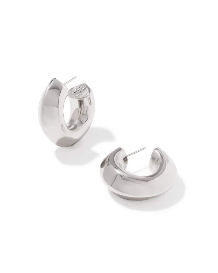 Pair of silver-tone Embry Hoop Earrings with a chunky, high-shine finish and ear post closures.