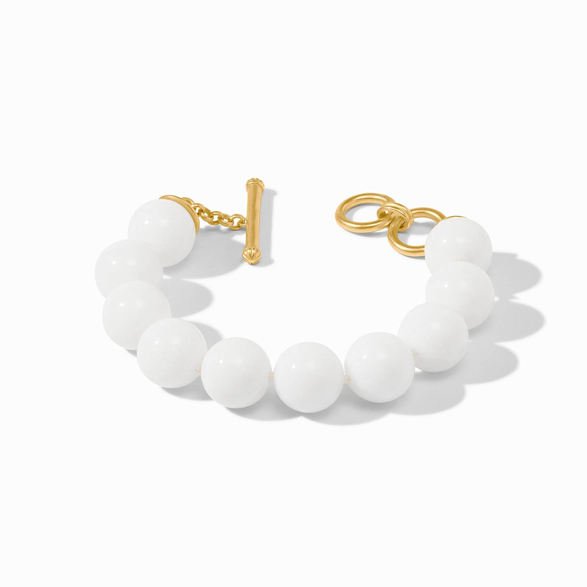 Polished Portofino beaded bracelet with adjustable toggle clasp in gold plate and jade beads.