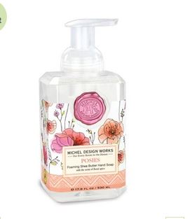 Foaming hand soap dispenser with a white bottle body.
