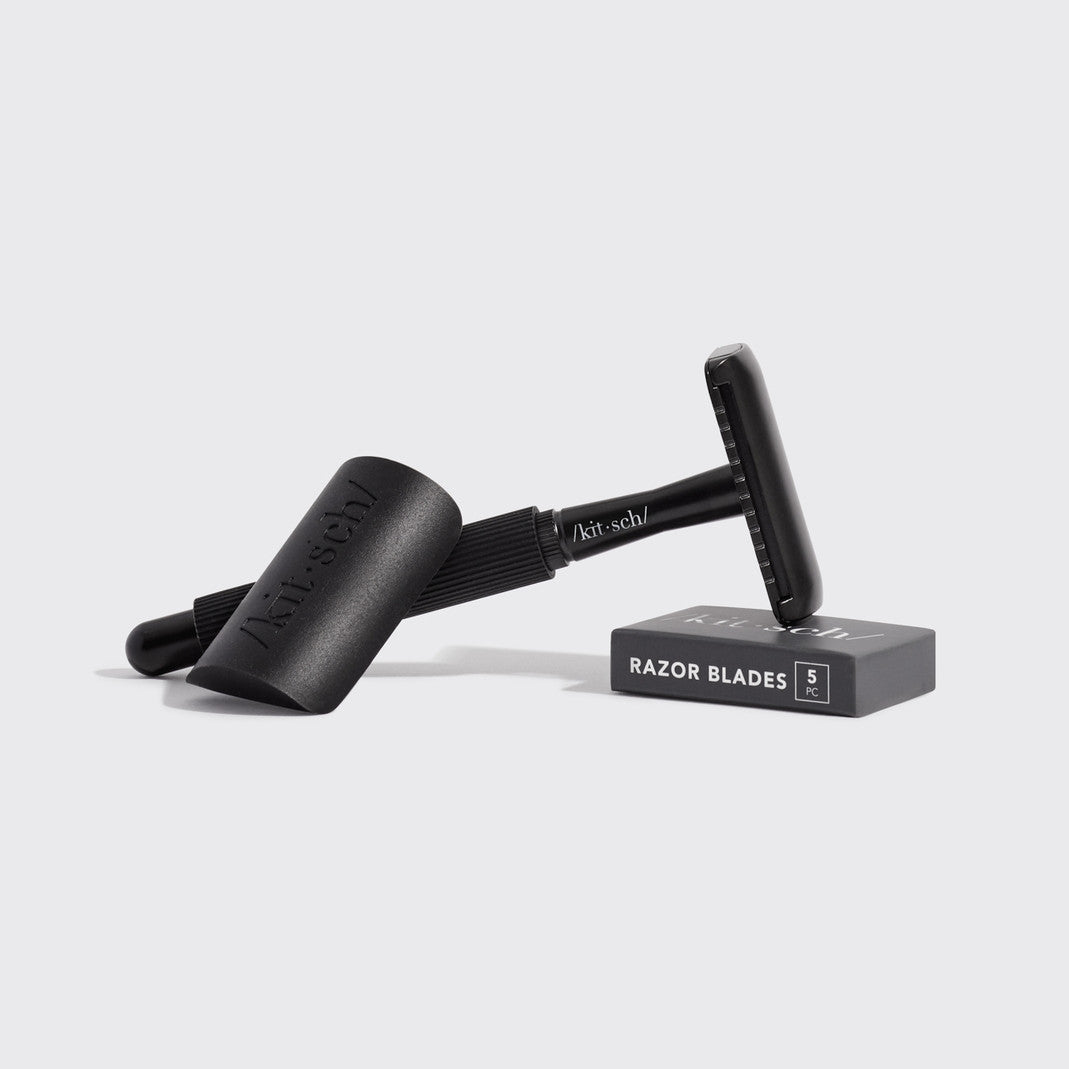 Black plastic-free safety razor with metal handle and five blade refills