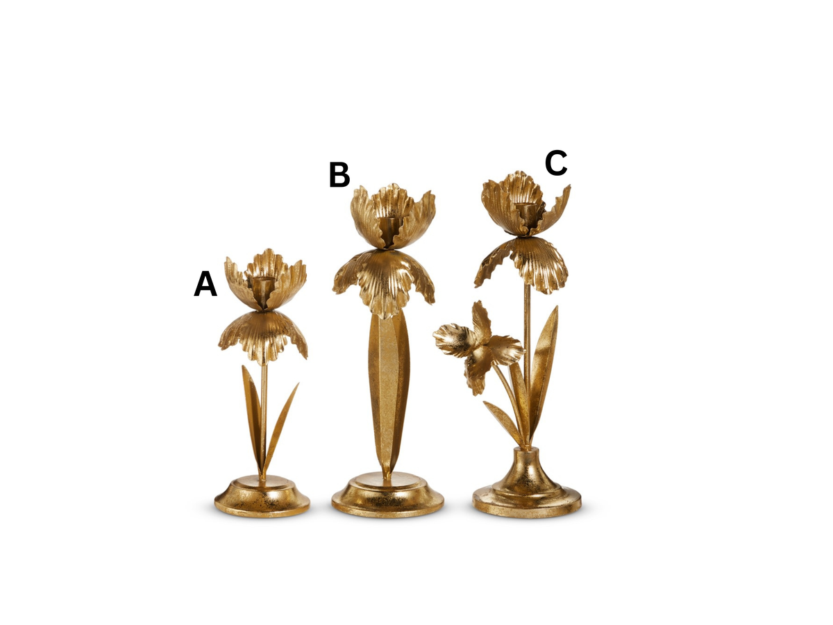 Three gold-finished iron flower candle holders in varying heights with petal and leaf details.
