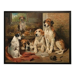 Vintage oil painting of a pack of hunting dogs in a wooden frame.