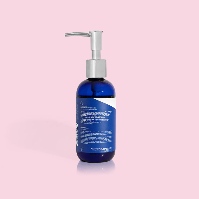 Bottle of Volcano hand wash in a clear container with dark liquid.