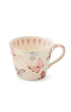 Cream-colored Butterfly Hill Mug with pink butterfly patterns and a decorative inner rim.