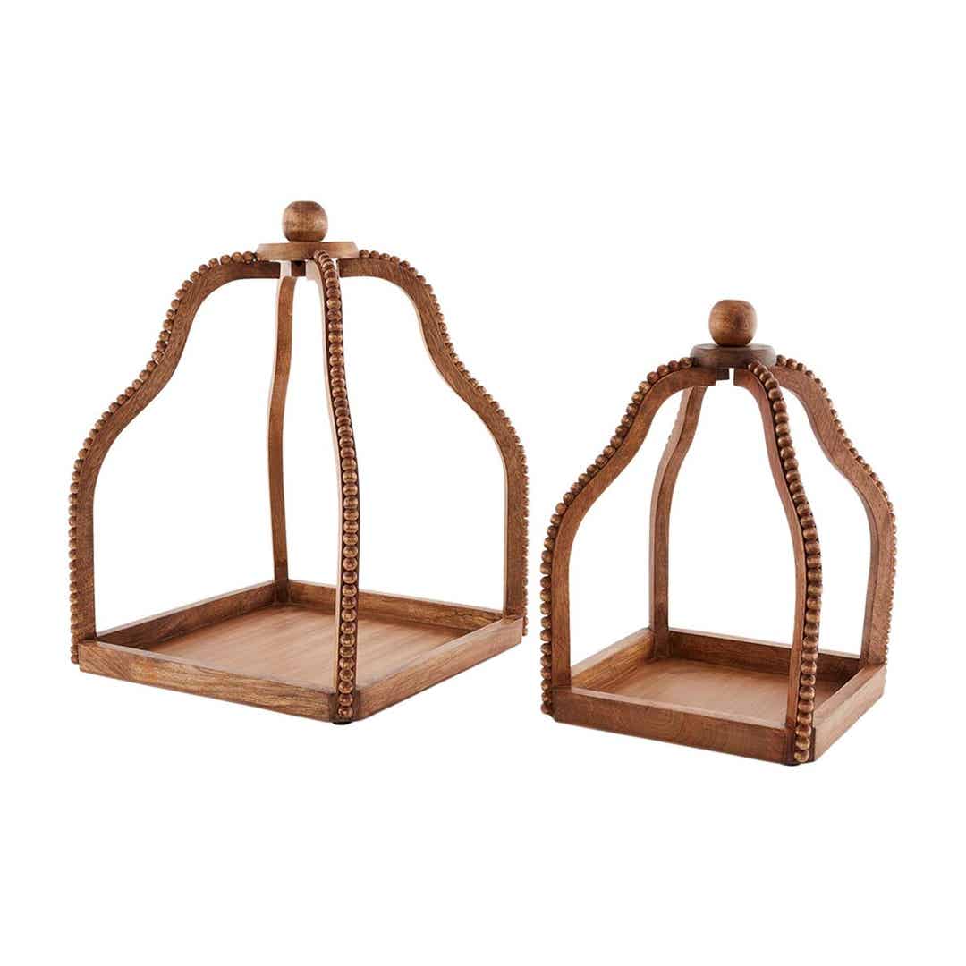 Beaded wood lantern made from mango wood with a natural finish.