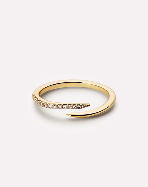 Oren Claw Ring in gold with cubic zirconia stones set on a brass base.